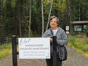 Carolyn at beginning of trail