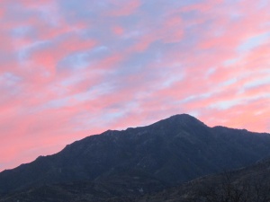 blue sky, pink clouds