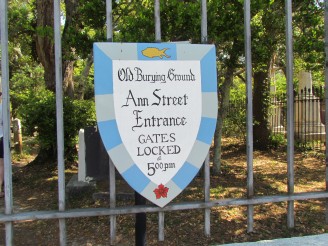 Sign on fence